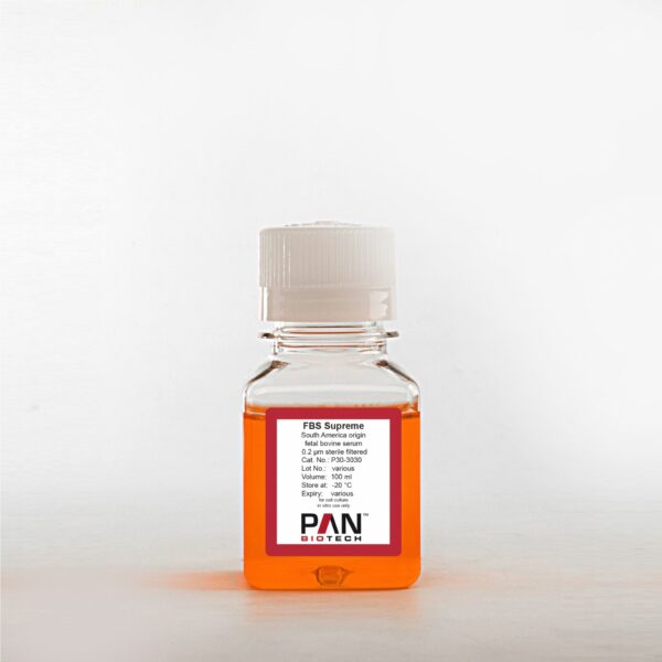 Small plastic bottle with a white cap containing a orangish brown solution of bovine serum.